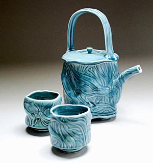 Blue teapot with cups